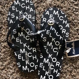 Girls size 3 Michael kors flip flops